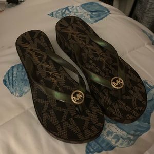 Brand new, Michael Kors Flip Flops size 6